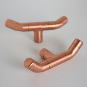 Curved Copper Handle on White Background