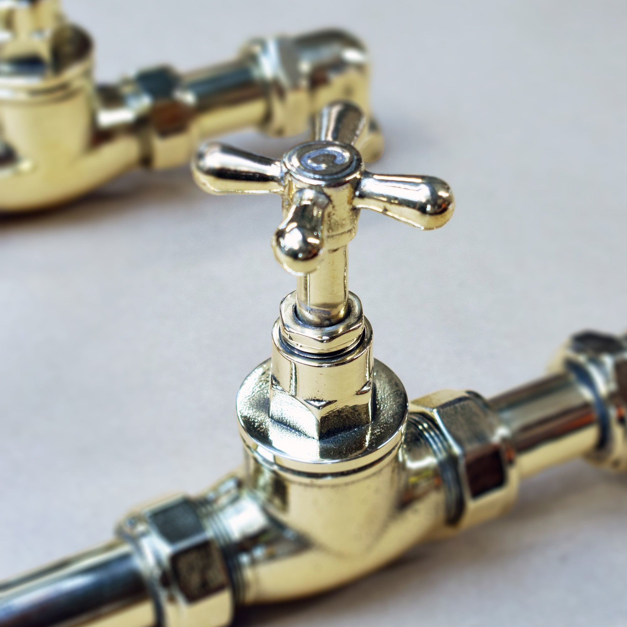 Brass wall mounted tap head closeup Brass Faucet
