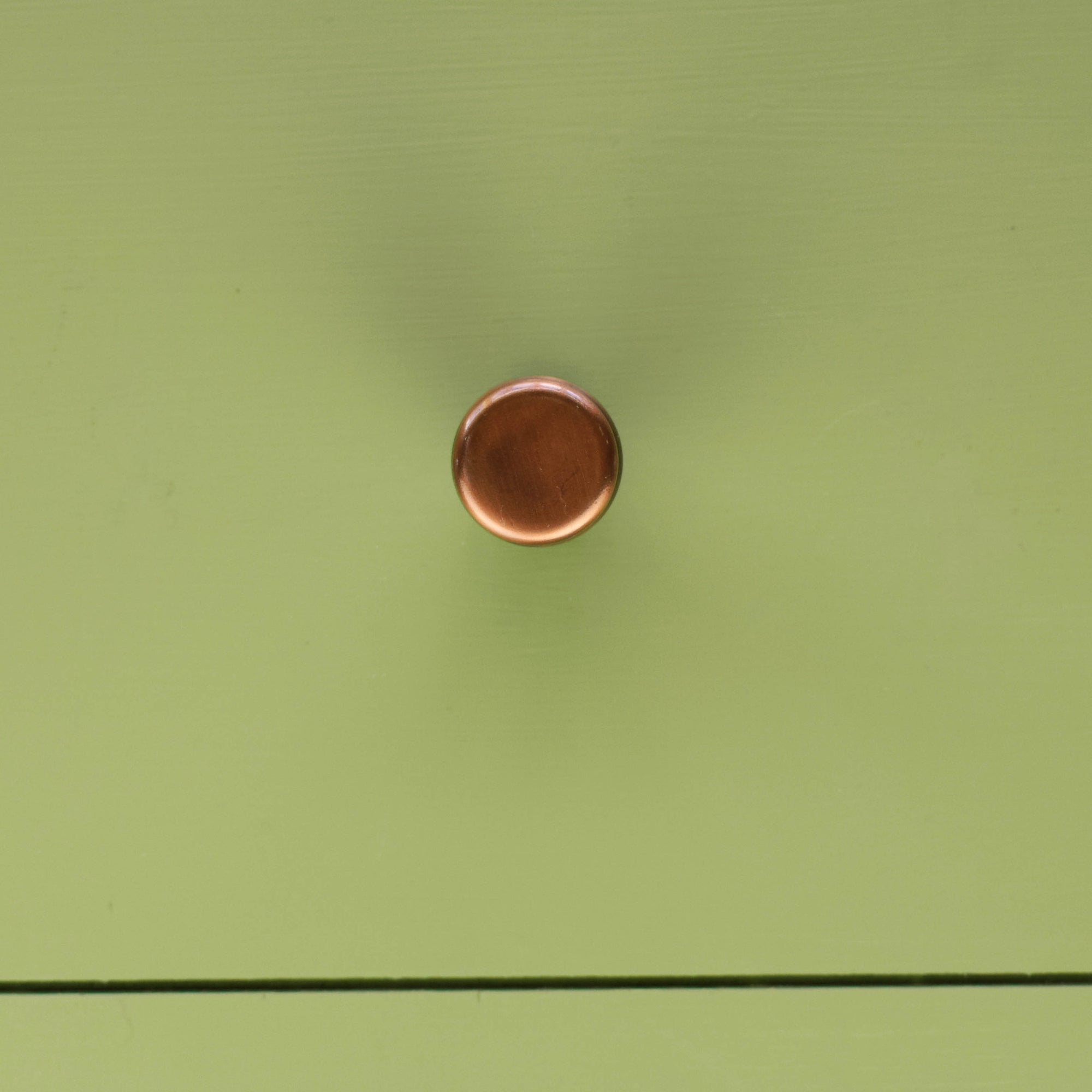 Copper Knob Aged - On Green Cabinet