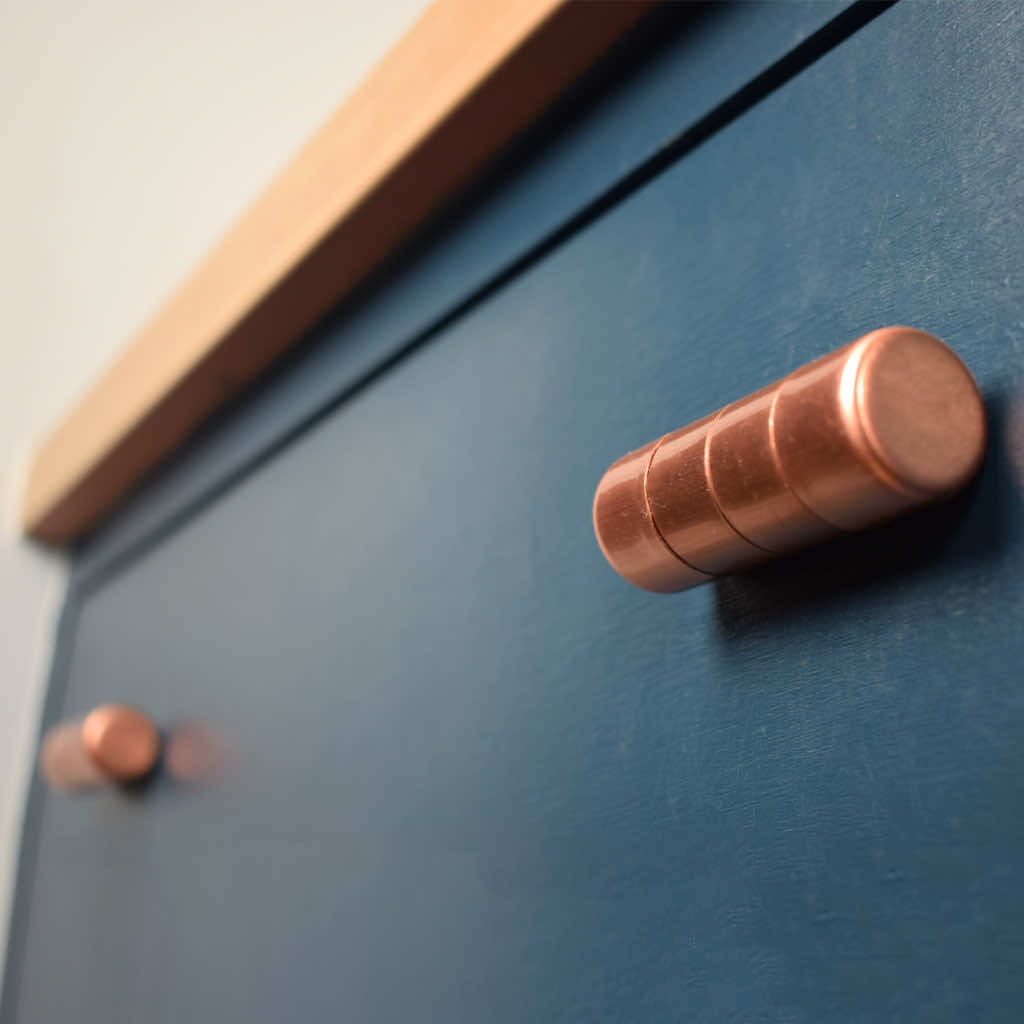 ridged chunky bar knob blue cabinets copper knobs