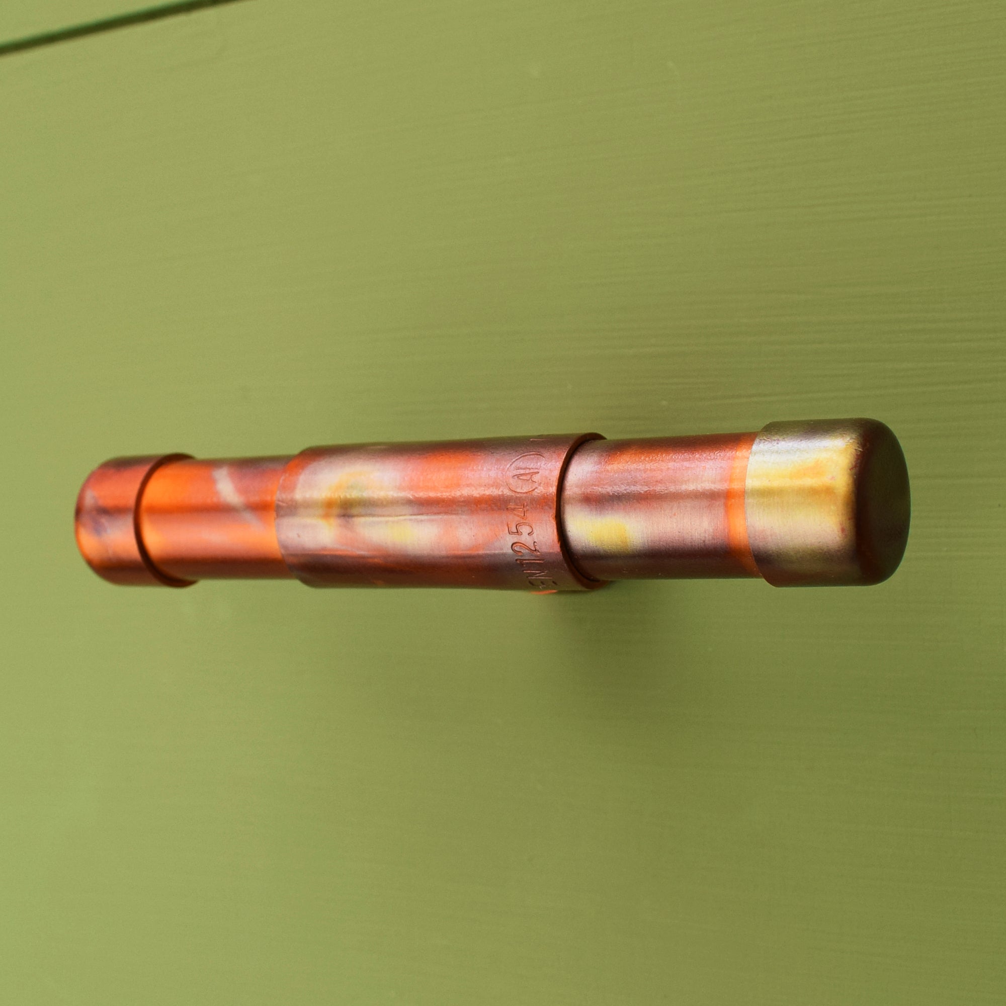 Copper Knob - Marbled Extended T-Shape - On Green Cabinet