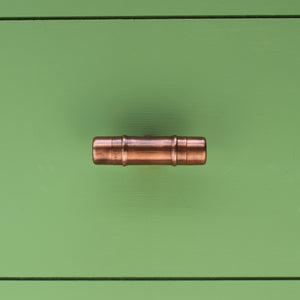 Copper Knob T-shaped - Aged - Green Background