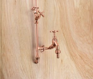 wash of your feet, dog shower or surf board with this handle tap attachment on a fully copper shower design